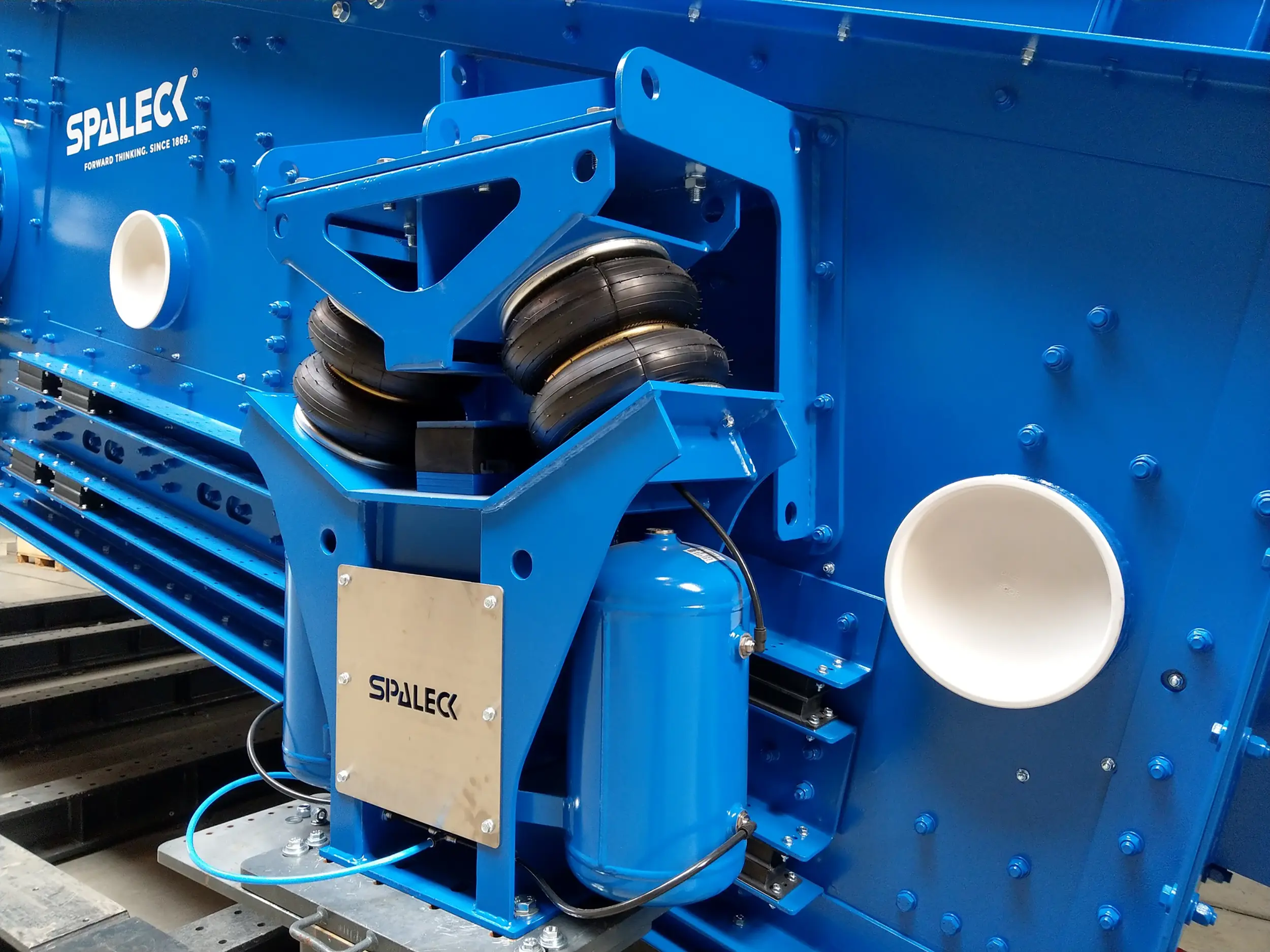 Componente azul de engenharia mecânica da SPALECK com suspensão pneumática.