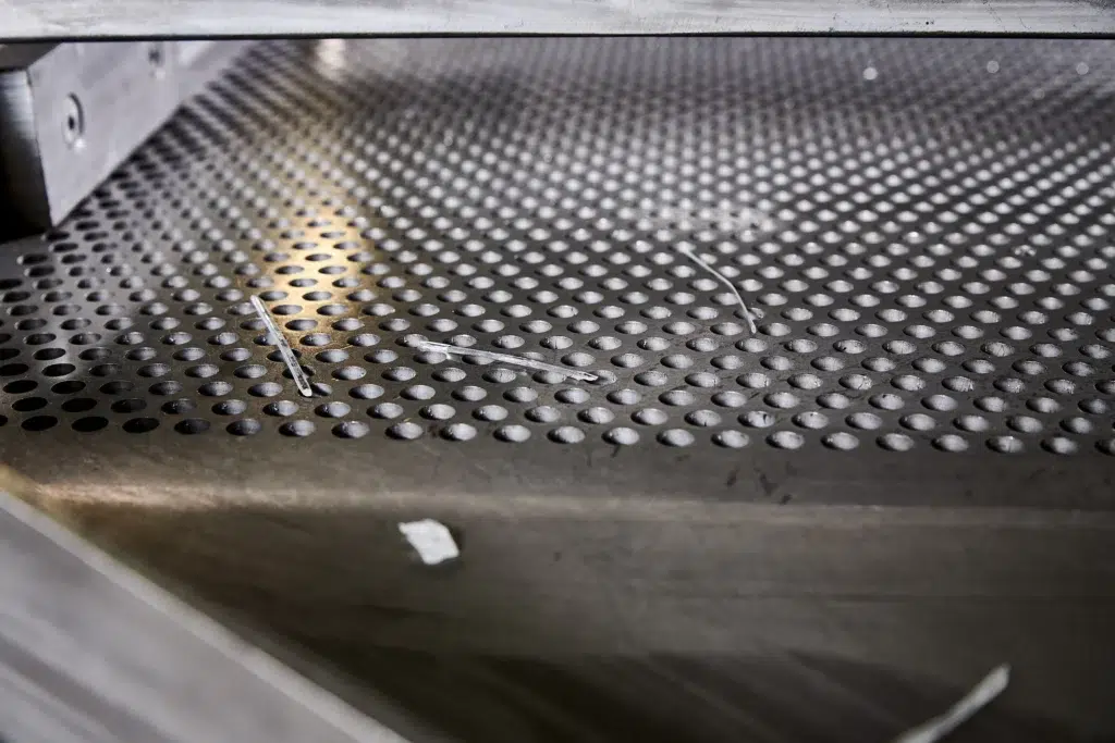 Vista detalhada de um separador de sobras na produção de plástico